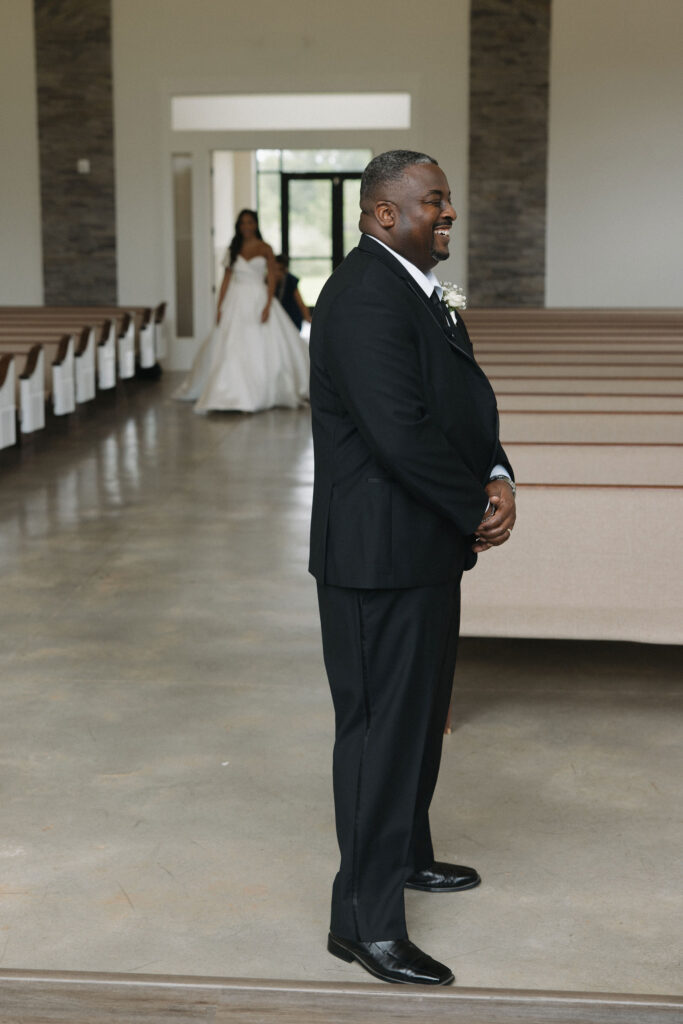 bride doing a first look with her father