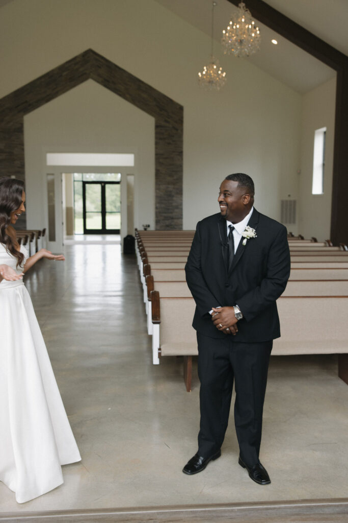 bride doing a first look with her father