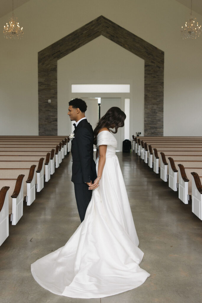 first touch and private vows before their summer wedding in Texas