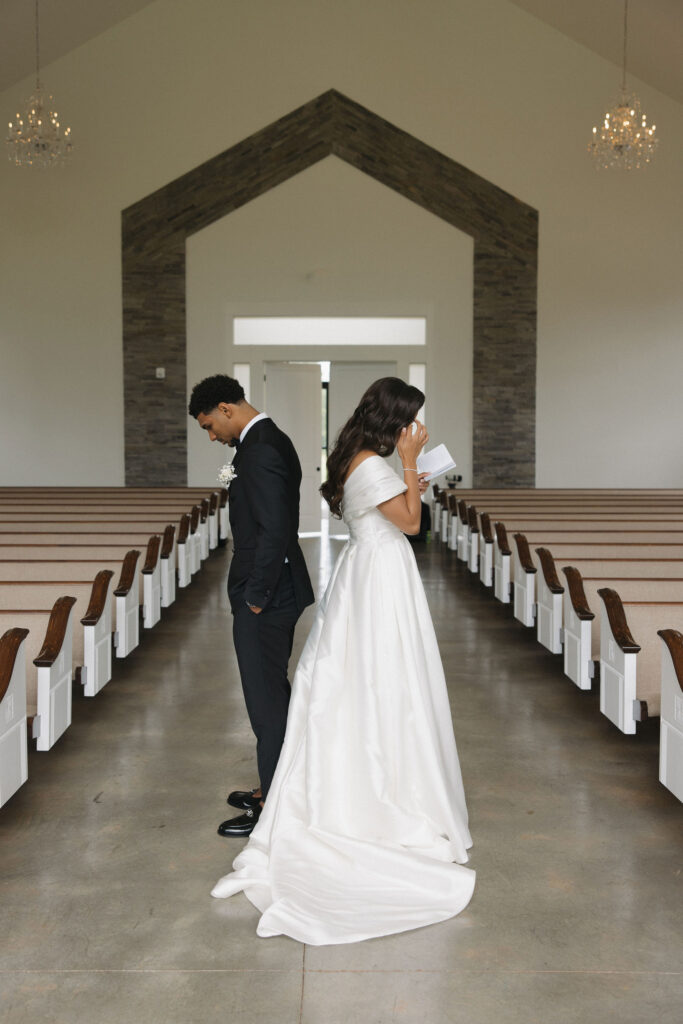 first touch and private vows before their summer wedding in Texas