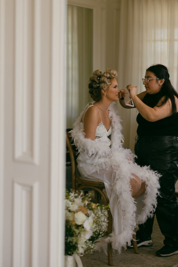 Bride getting ready for her wedding at The Chapel at Palacios in Westlake Texas