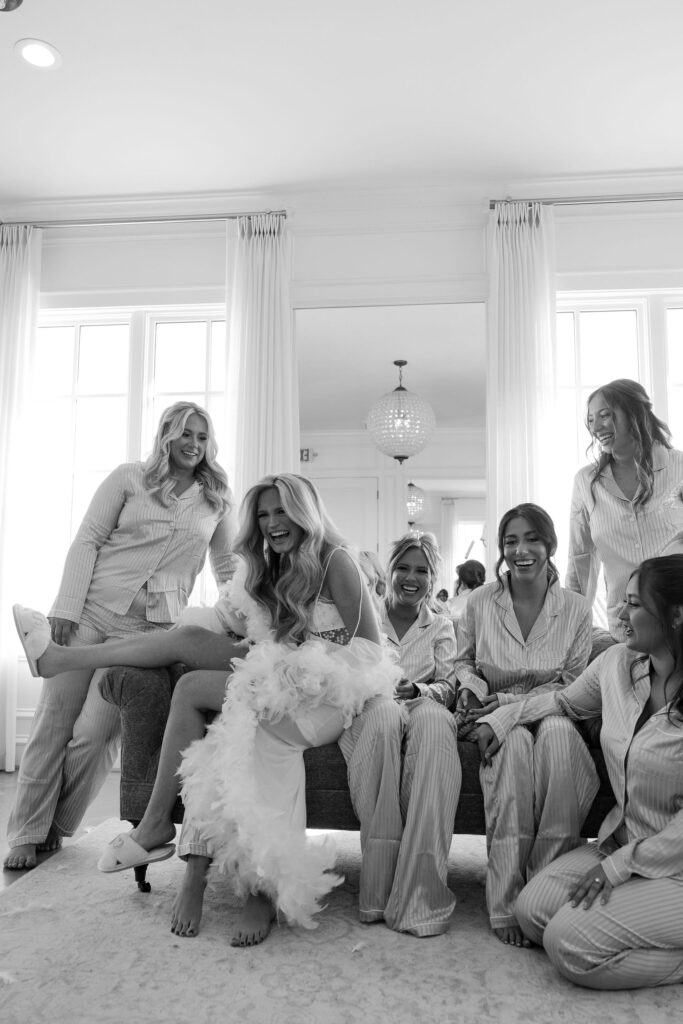 Bride and her bridesmaids getting ready for the wedding day