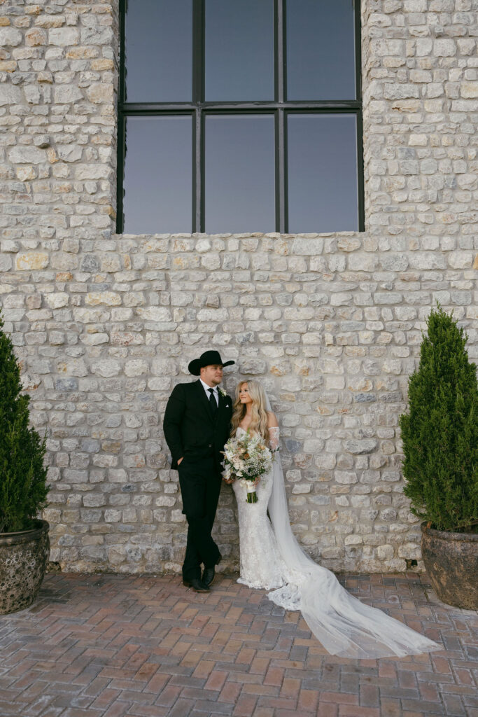 bride and groom golden hour portraits at The Chapel at Palacios