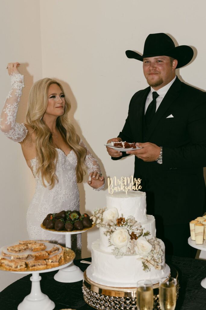 bride and groom cut their wedding cake