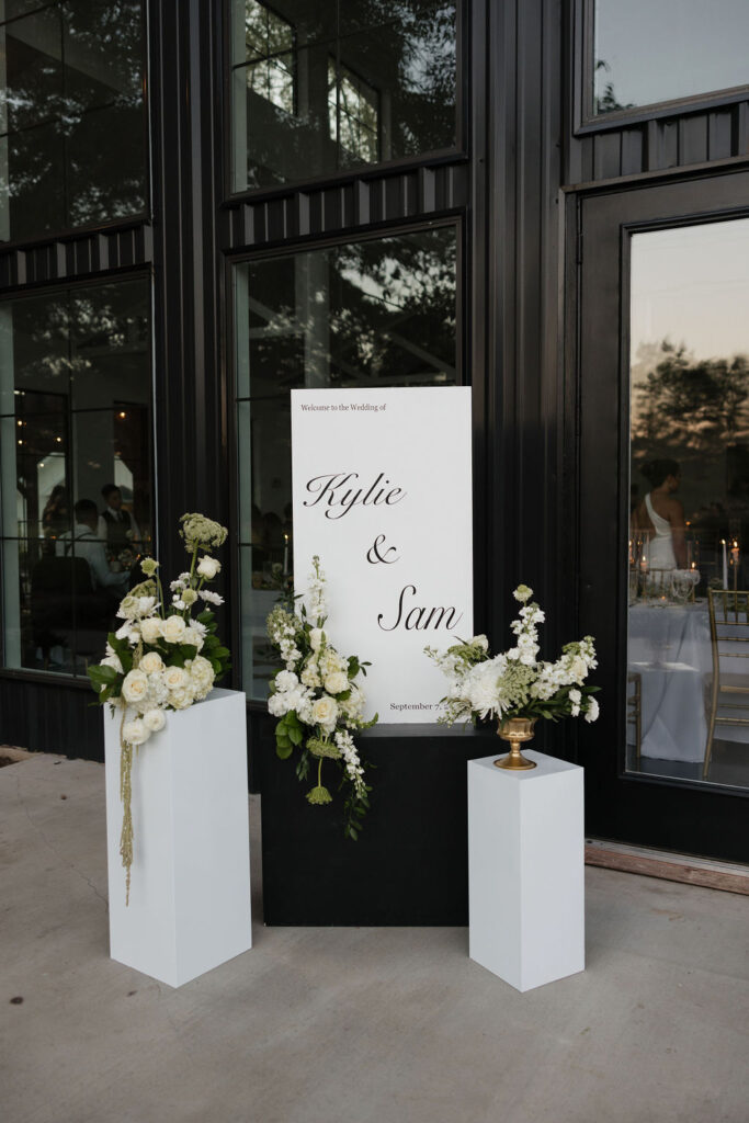 wedding signs with white florals for a Texas wedding