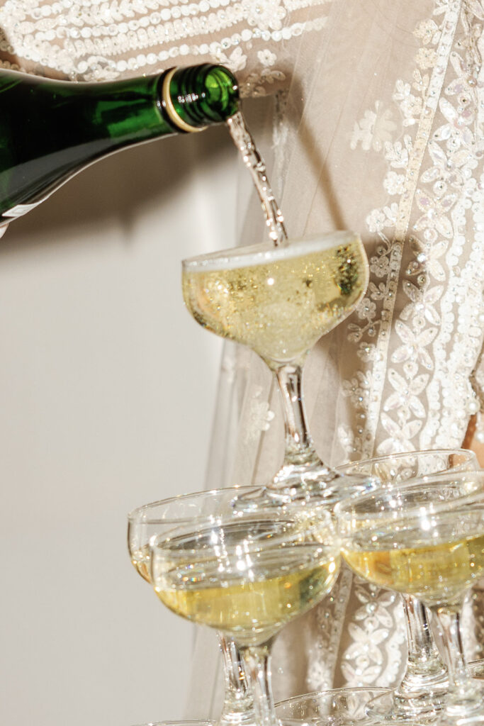 Close up of a champagne pour during a wedding reception