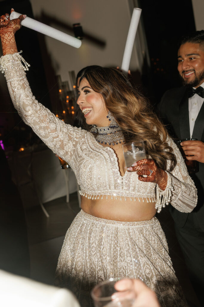 A bride dancing during her wedding reception 