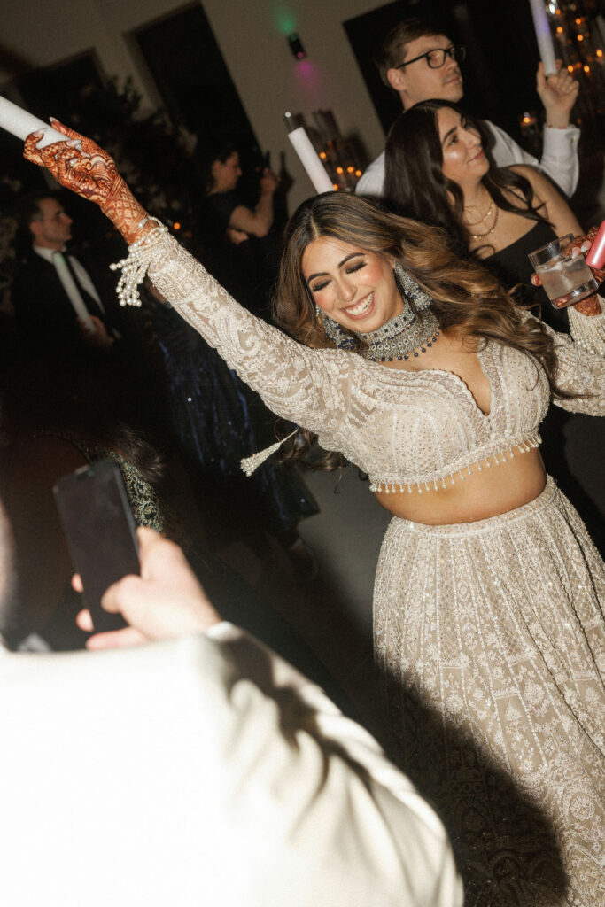 A bride dancing during her wedding reception 