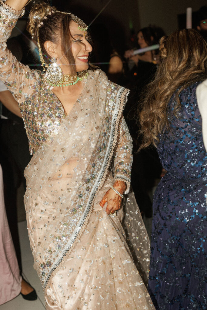 Wedding guest dancing during a wedding reception