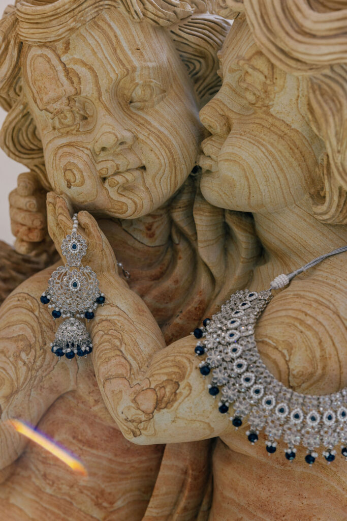 Indian bridal jewelry on a statute