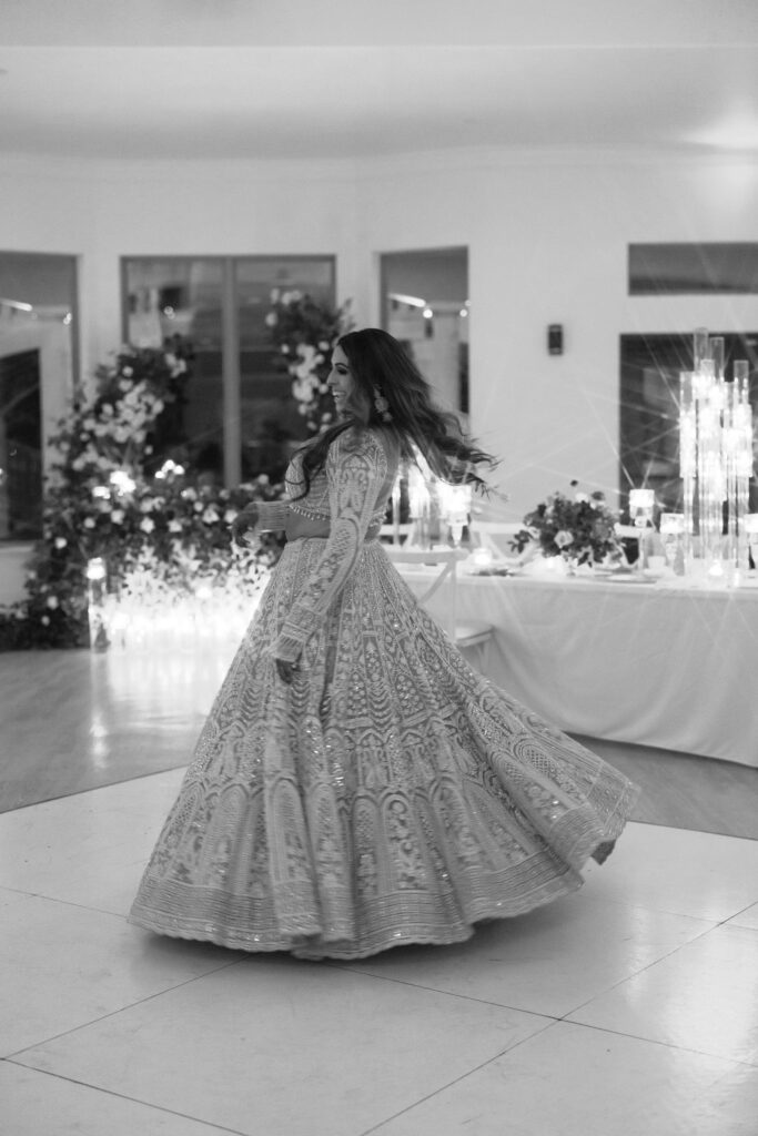 Bride dancing during her wedding reception at D'Vine Grace Vineyard