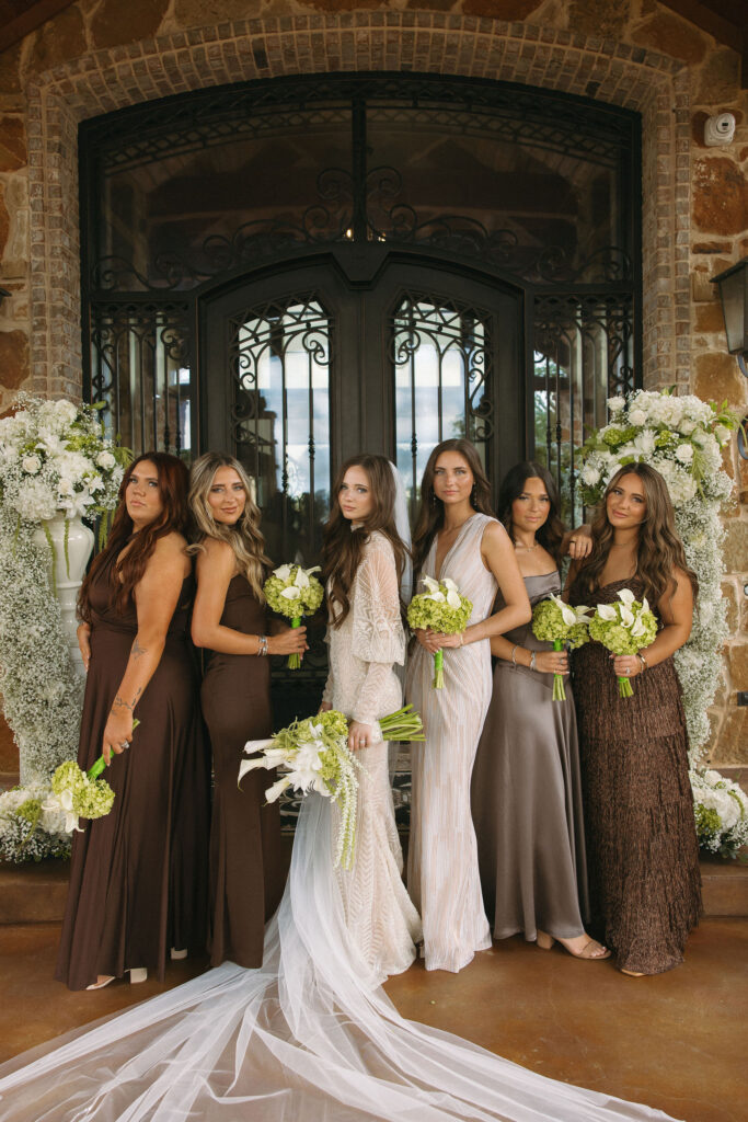 bride with her bridesmaids