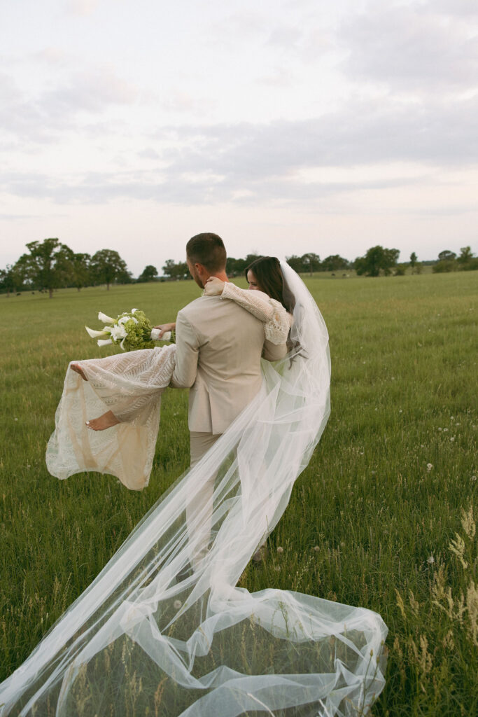 Wedding portraits in a field in Athens Texas