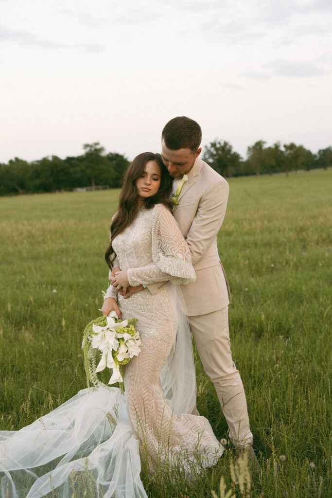 Wedding portraits in a field in Athens Texas