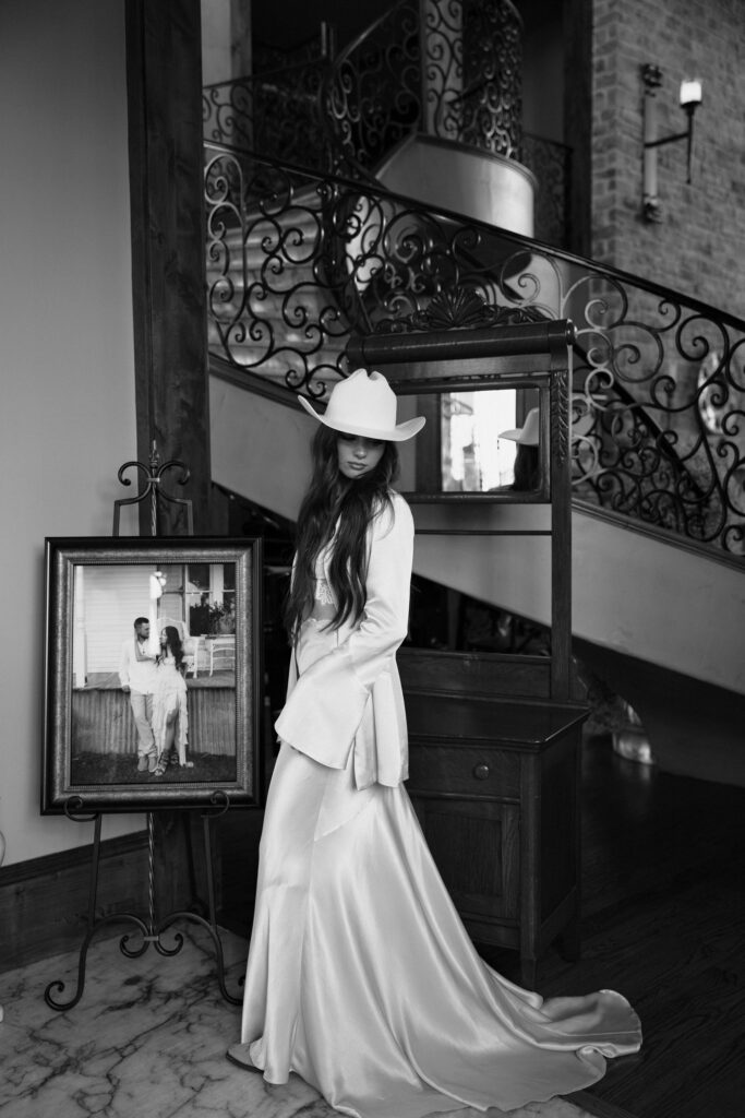 Bride wearing a bridal western look to her rehearsal dinner