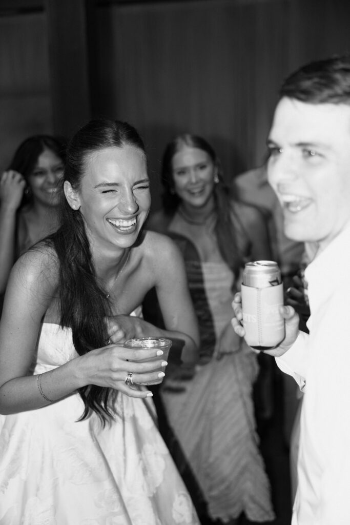 bride laughing at wedding