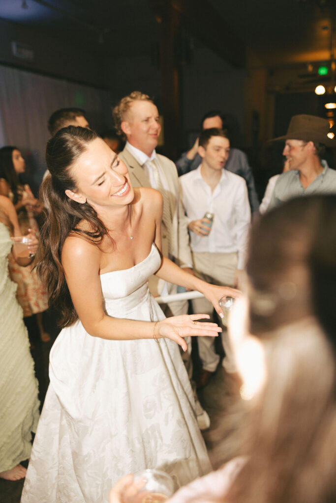 bride having fun at wedding