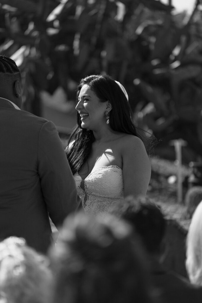 bride laughing at wedding in california