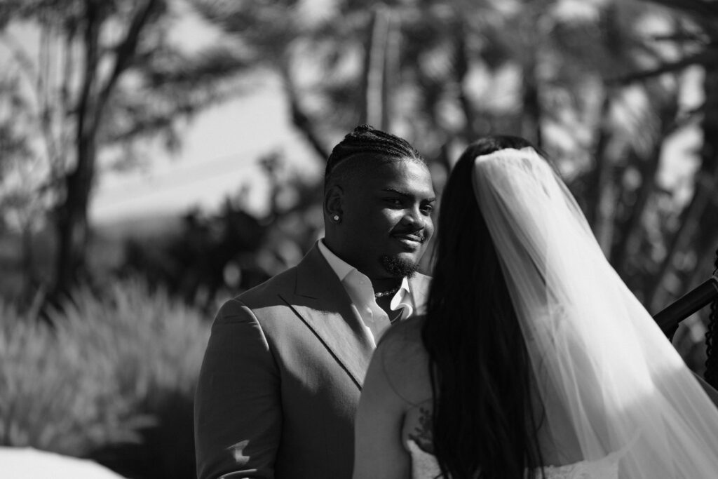 black and white photo of groom
