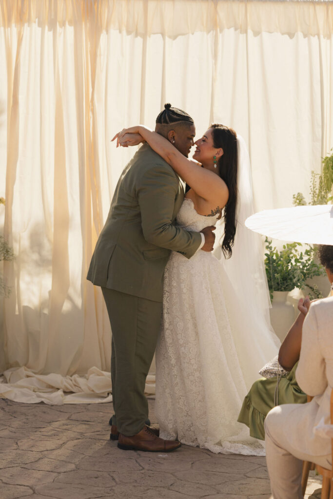 wedding first kiss in california