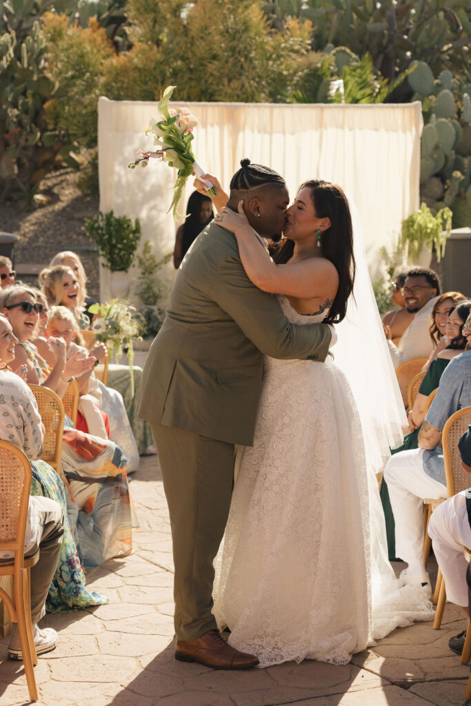 bride and groom kissing