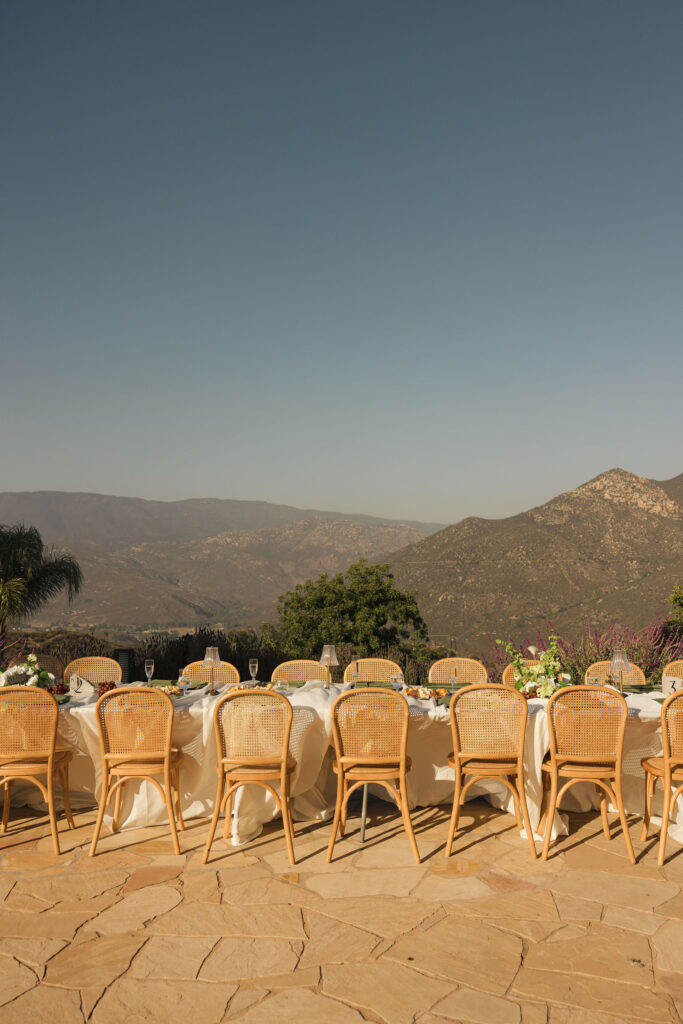 wedding dinner table in front of mountains in san diego california
