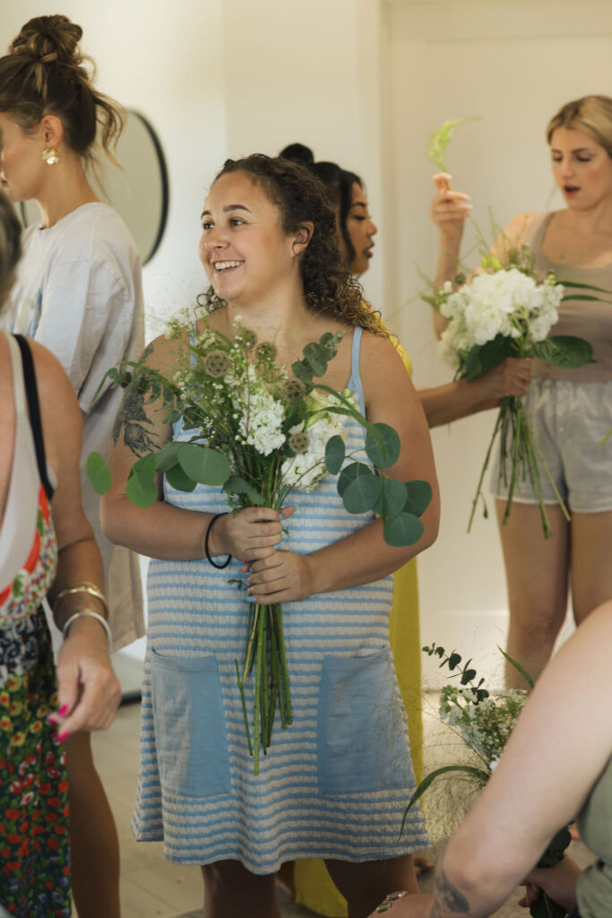 girl smiling with flowers