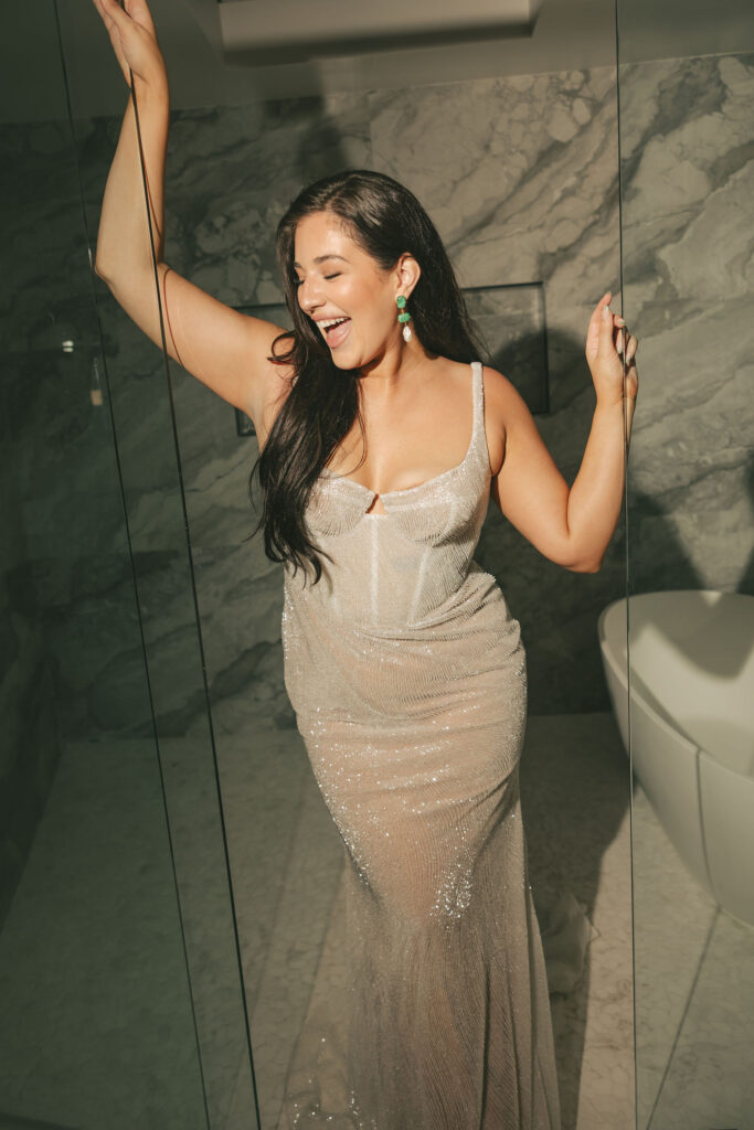 bride happy in beaded wedding dress in california