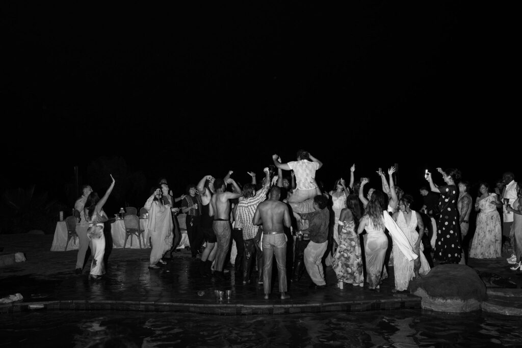 friends partying at wedding in california