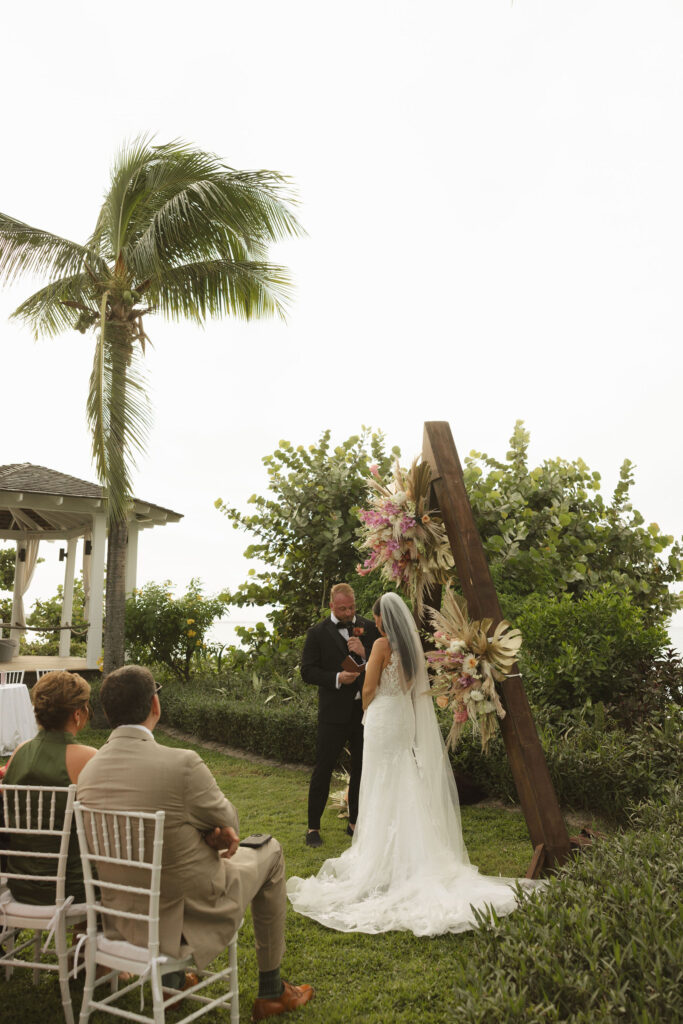 Turks and Caicos Wedding groom saying vows
