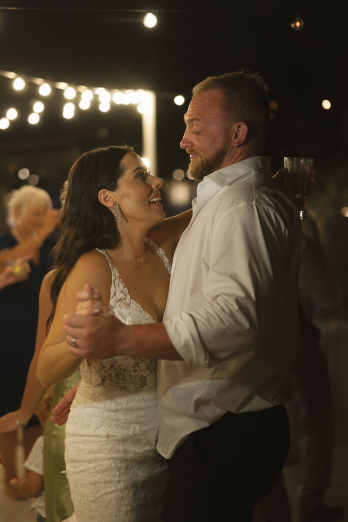 bride and groom dancing at reception