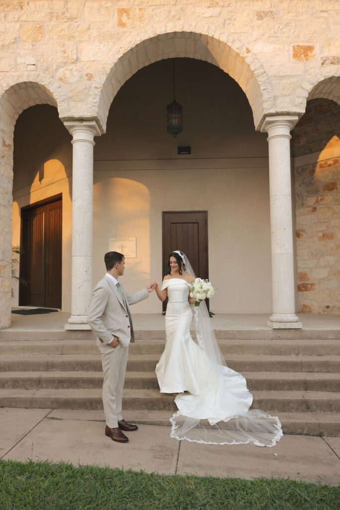 bride and groom outside greek orthodox church