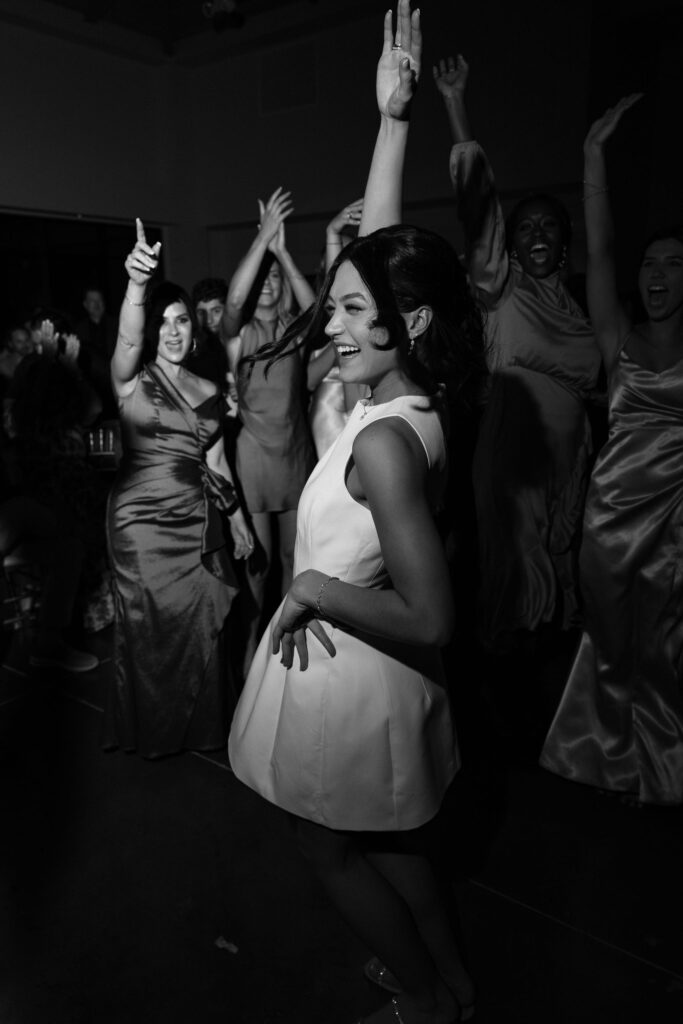 bride smiling at wedding reception