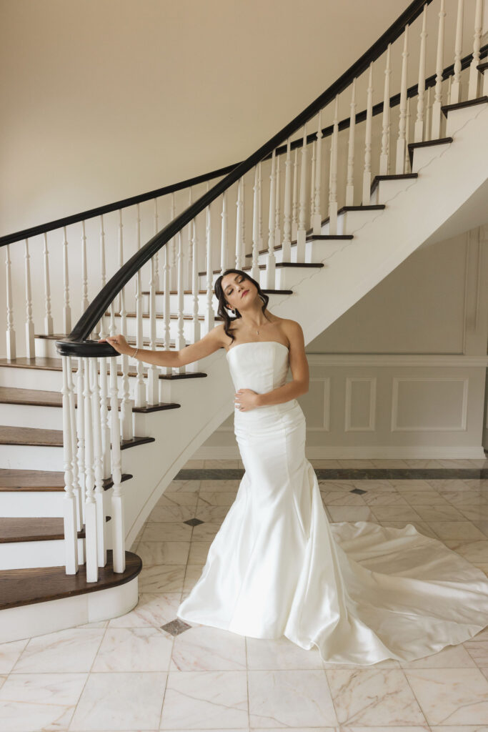 bride in sunny room by stairway