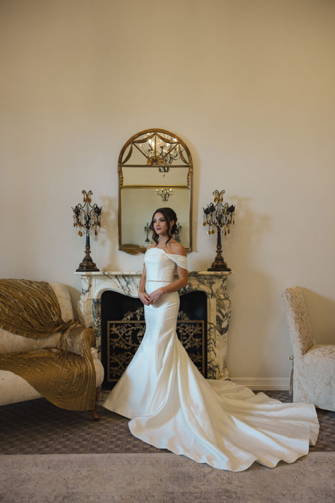 full length image of bride in wedding dress