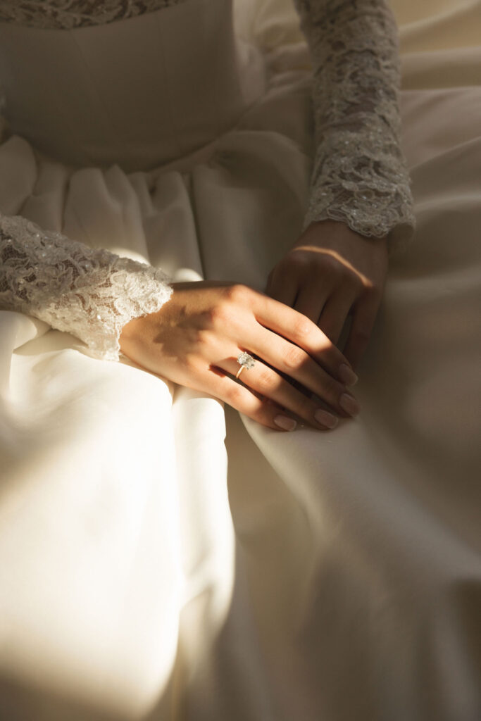 close up of bride and engagement ring