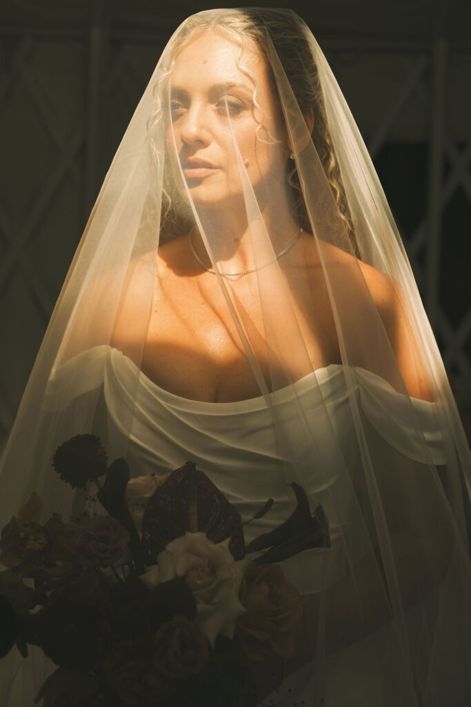 bride in veil with flowers