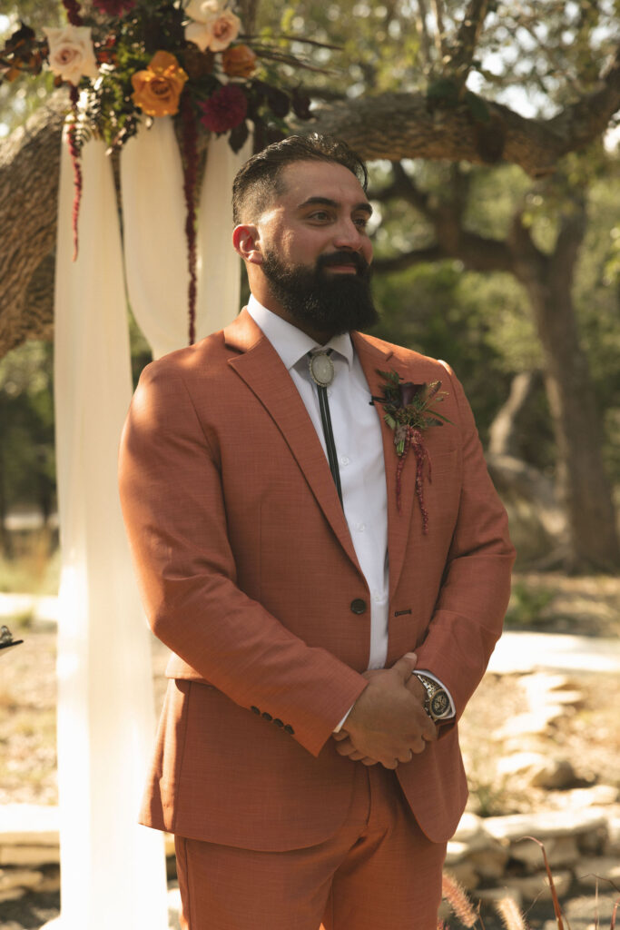 groom at alter at cedars ranch