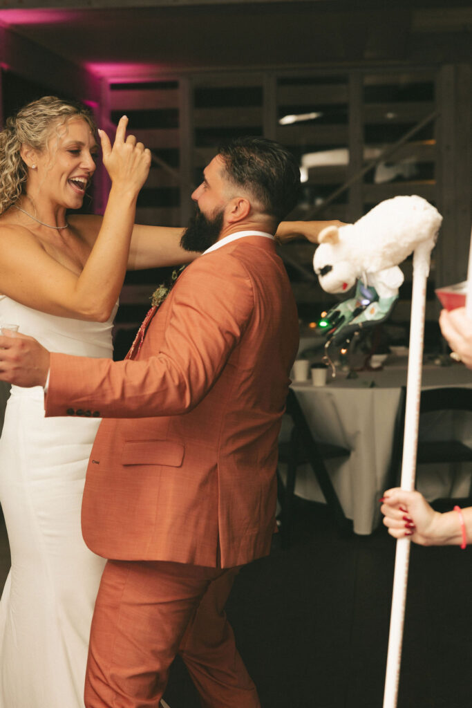 bride and groom partying at reception