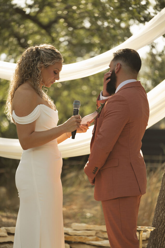 bride and groom at outdoor wedding ceremony