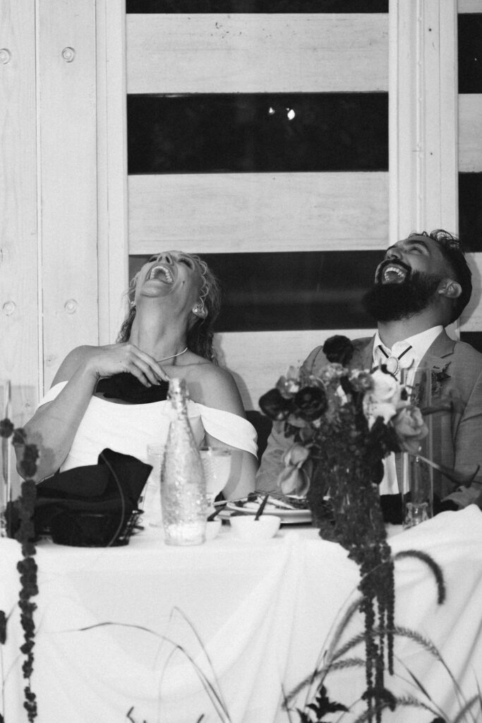 bride and broom laugh together at the cedars ranch